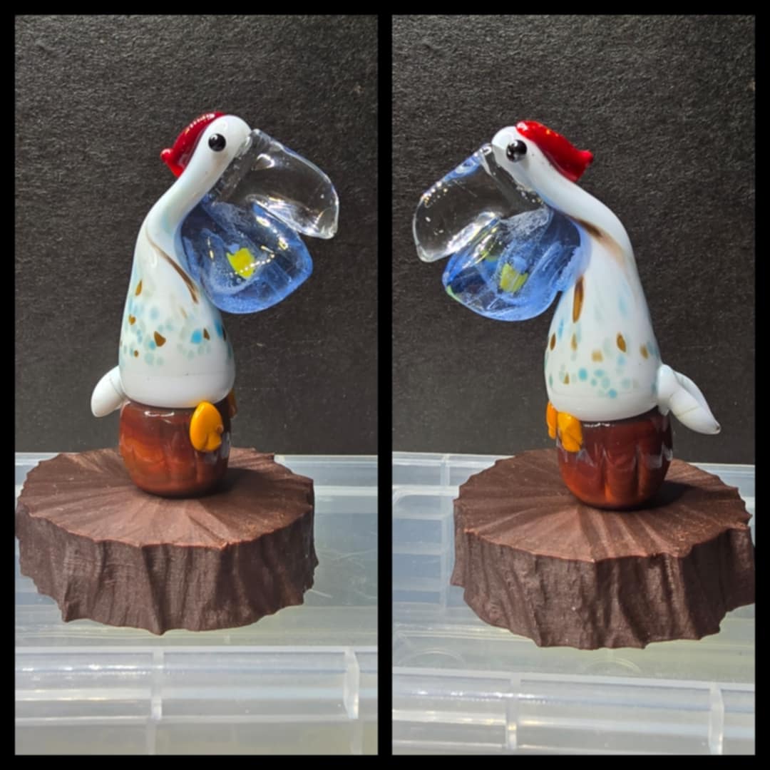 Glass Cute Pelican with fish in mouth